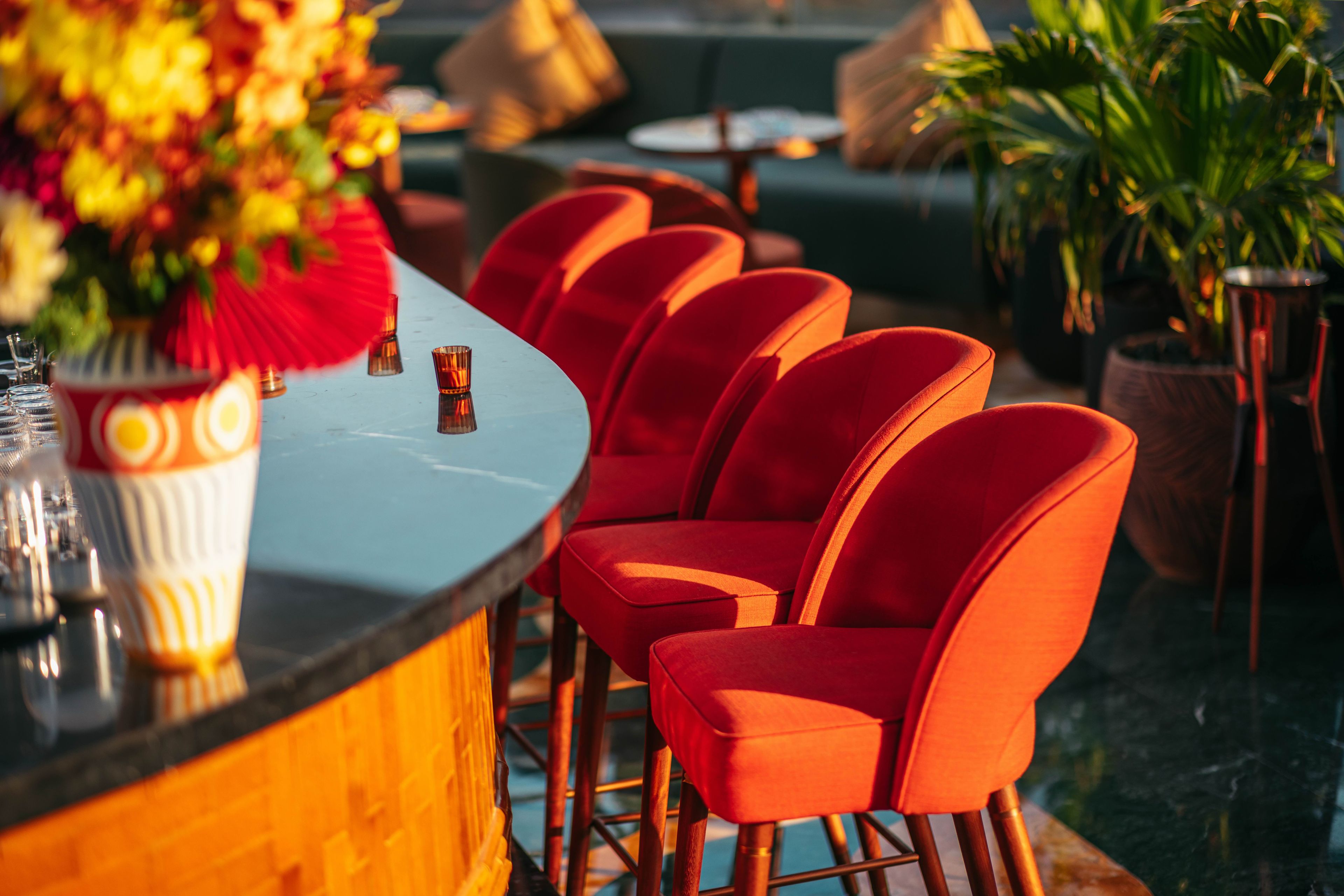 SUSHISAMBA ABU DHABI terrace bar, with orange chairs aligned